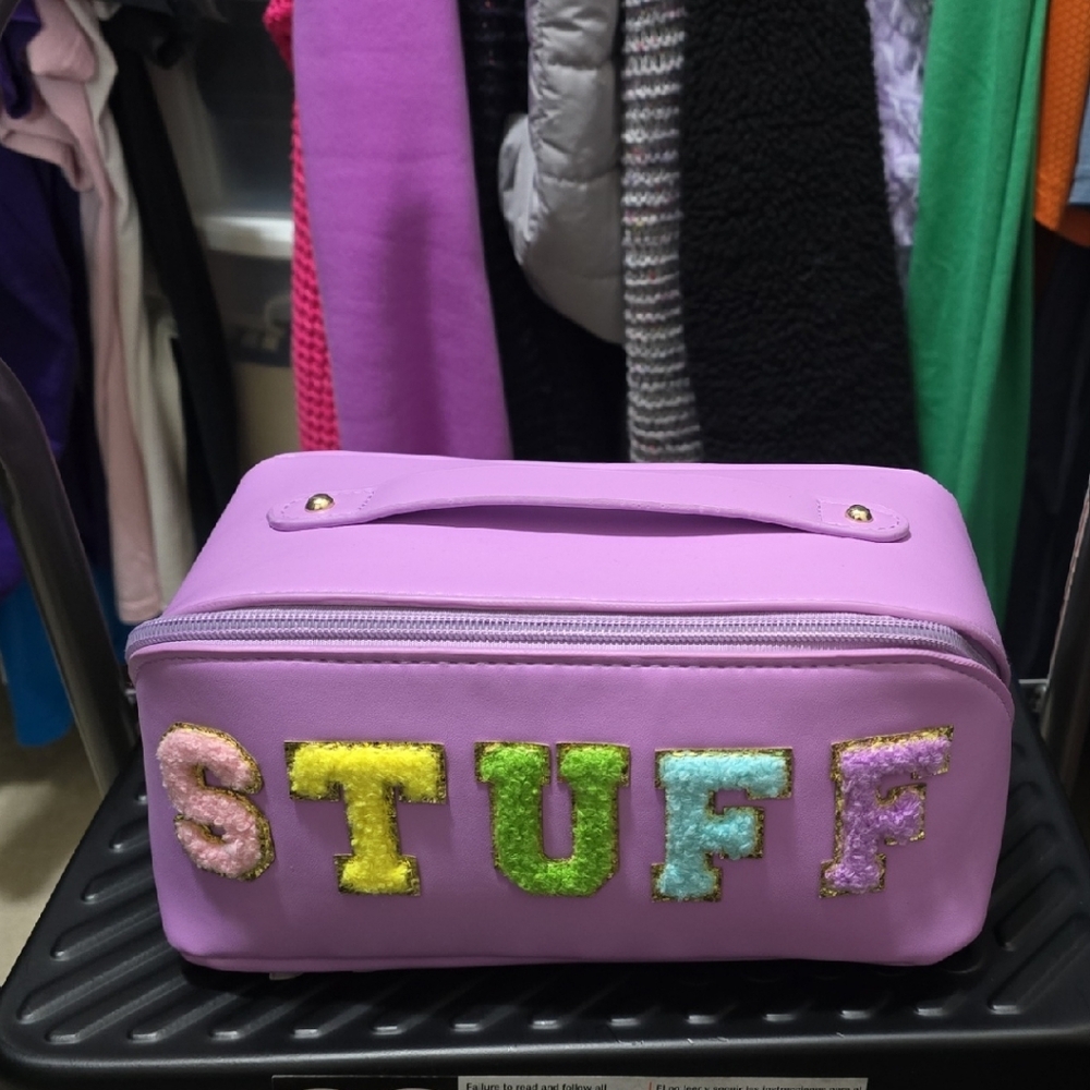 Vibrant Purple Cosmetic Bag with 'STUFF' Design